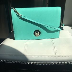 Kate Spade leather crossbody turn lock closure